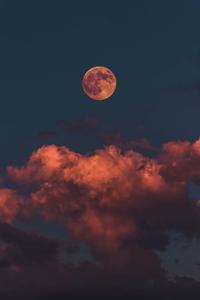 Schöner oranger mond und wolken iphone hintergrund