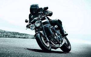 Black Motorcycle In Cornering Mode motorcycle wallpaper