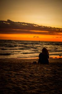 Blissful Woman Enjoying a Summer Day at the Beach beach wallpaper