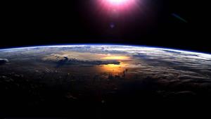 Blue Planet Brightly Lit by the Sun earth wallpaper