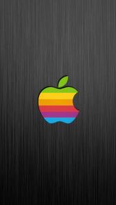 Bright and Colorful Apple Gadget Apple Fruits Being Showcased  Wallpaper