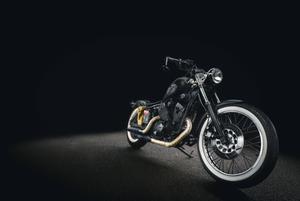 A vintage black motorcycle showcasing antiquity and elegance motorcycle wallpaper