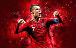  Caption: Cristiano Ronaldo dominating the field in action  Wallpaper