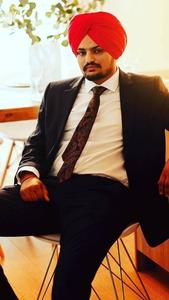  Caption: Sidhu Moosewala, the icon of Punjabi Music Industry  Wallpaper