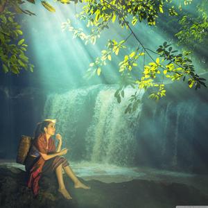Capturing the beautiful moments near a peaceful waterfall. beautiful wallpaper