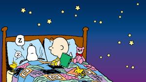 Charlie Brown reads to Snoopy snoopy wallpaper