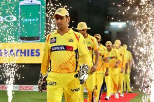 Chennai Super Kings in action on the field csk wallpaper