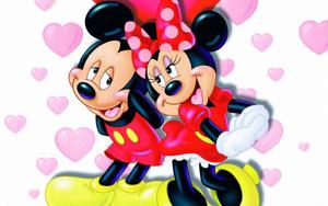 Classic Mickey Mouse with his signature red costume bringing his beloved classic sense of fun mickey mouse wallpaper