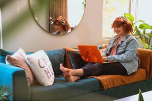 Cozy home office environment with a pink laptop cute laptop wallpaper