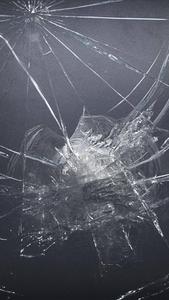 Cracked Screen On Gray Surface cracked screen wallpaper