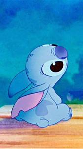 Cute and Mischievous Stitch from Disney's Lilo & Stitch Wallpaper