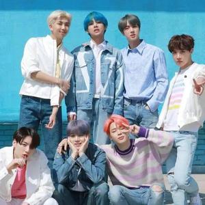 Cute BTS Group Poses Together On A Blue Wall cute bts group wallpaper