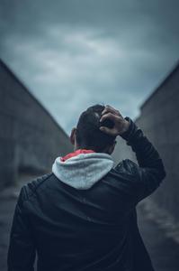 Desolate Emotions - A Solemn Young Boy Against a Vast Perspective sad boy wallpaper