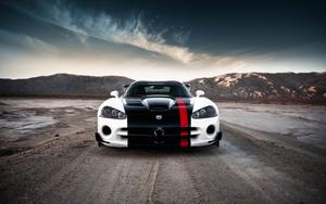 Driving Through the Snow-Capped Mountains car wallpaper