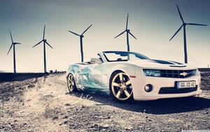 Driving through Windmills in a Luxury Car car wallpaper