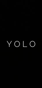 Embrace Life with 'YOLO' Motivation on a Black Backdrop black motivation wallpaper