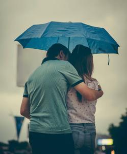 Embrace of Love Under an Umbrella romantic love wallpaper