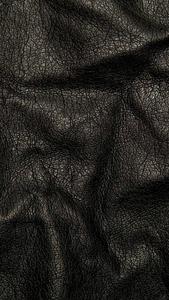 "Enigmatic Elegance: Crumpled Leather 4K Ultra HD Dark Phone Wallpaper” 4k ultra hd dark phone wallpaper