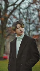 Enigmatic Jungkook in a stylish black outfit jungkook wallpaper