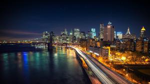 Enjoy the scenic beauty of the city at night Wallpaper