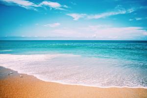 Enjoy the Serene Beauty of a Coastal Landscape beach wallpaper