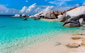 Enjoying a picturesque Summer day at the beach beach wallpaper