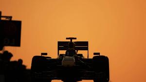 Exciting Action of F1 Racing Car in Silhouette f1 wallpaper