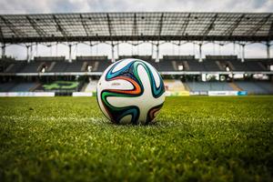 Experience the Thrill of Football in an Exciting Stadium football wallpaper