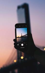 Explore the world with your mobile phone. Wallpaper