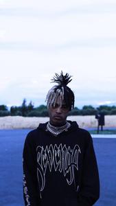 Fans of XXXTentacion Rock His Signature Black Hoodie xxxtentacion wallpaper