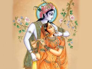 Find divine grace and wisdom in the love of Radha and Krishna. Wallpaper