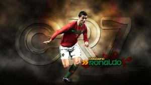 Football superstar Cristiano Ronaldo celebrates an historic win.  Wallpaper