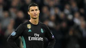 Football superstar Cristiano Ronaldo celebrating a goal. Wallpaper