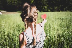Girl Holding Mothers Day Card mothers day wallpaper
