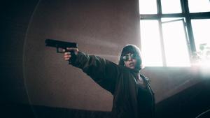 Girl Pointing A Gun gun wallpaper