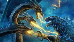 Godzilla and King Ghidorah face off in a lightning clash godzilla wallpaper