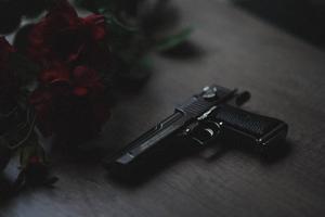 Gun And Red Roses gun wallpaper