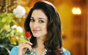Heroine Actress Holding A Rose heroine wallpaper
