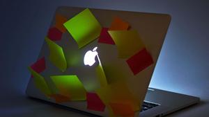 Illuminated Blue Apple Logo on Black Background apple logo wallpaper