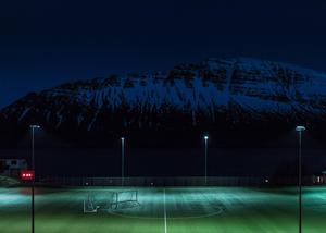 Illuminated night football field ready for the game. football wallpaper
