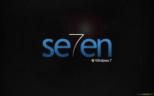 Illuminated Windows 7 Logo on Dark Background windows 7 wallpaper