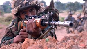 Indian Army Man Holding A Rifle indian army wallpaper