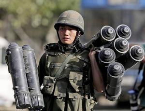 Indian Army Man Holding Ammos indian army wallpaper
