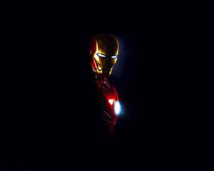 Iron Man Helmet Glowing Eyesand Arc Reactor Wallpaper