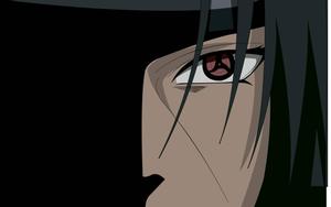 Itachi Uchiha, the Uchiha clan prodigy, stares into the camera with his Sharingan eye. Wallpaper