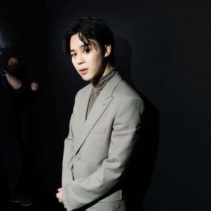 Jimin from BTS showcasing his signature style on stage jimin wallpaper