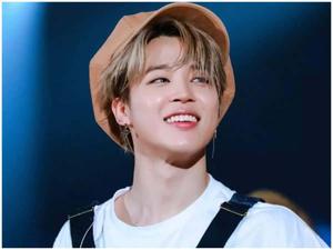 Jimin of the K-Pop group BTS enjoys an evening walk. jimin wallpaper