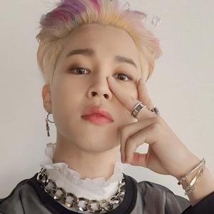 Jimin of the popular South Korean boy band BTS posing for photos. jimin wallpaper