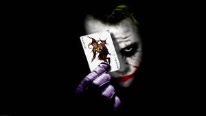 Joker Holding Card joker wallpaper
