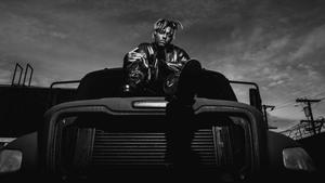 Juice Wrld in a black and white truck juice wrld wallpaper